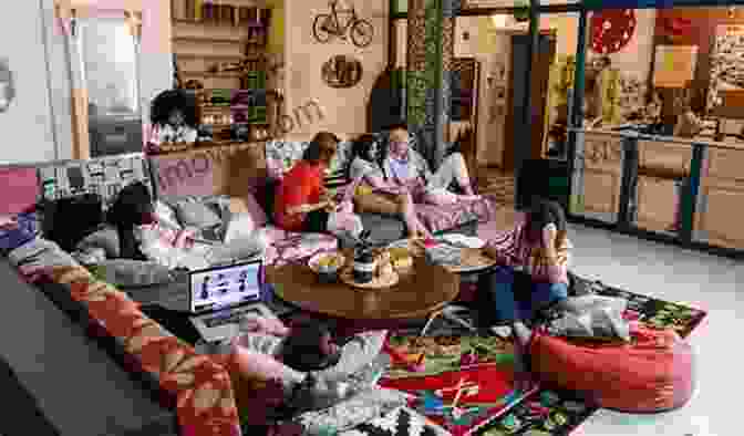 A Group Of People Hanging Out In A Hostel Common Area How To Travel The World For Free: The Ultimate Guide On How To Travel Free And Explore Our Incredible World NOW