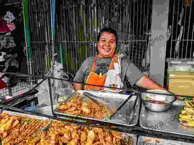 A Woman Eating Street Food From A Vendor's Cart How To Travel The World For Free: The Ultimate Guide On How To Travel Free And Explore Our Incredible World NOW