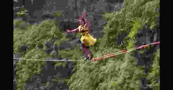 Rajib Mukherjee, The Renowned Wirewalker, Posing Confidently On A Tightrope High Above The Ground. Wirewalker Rajib Mukherjee